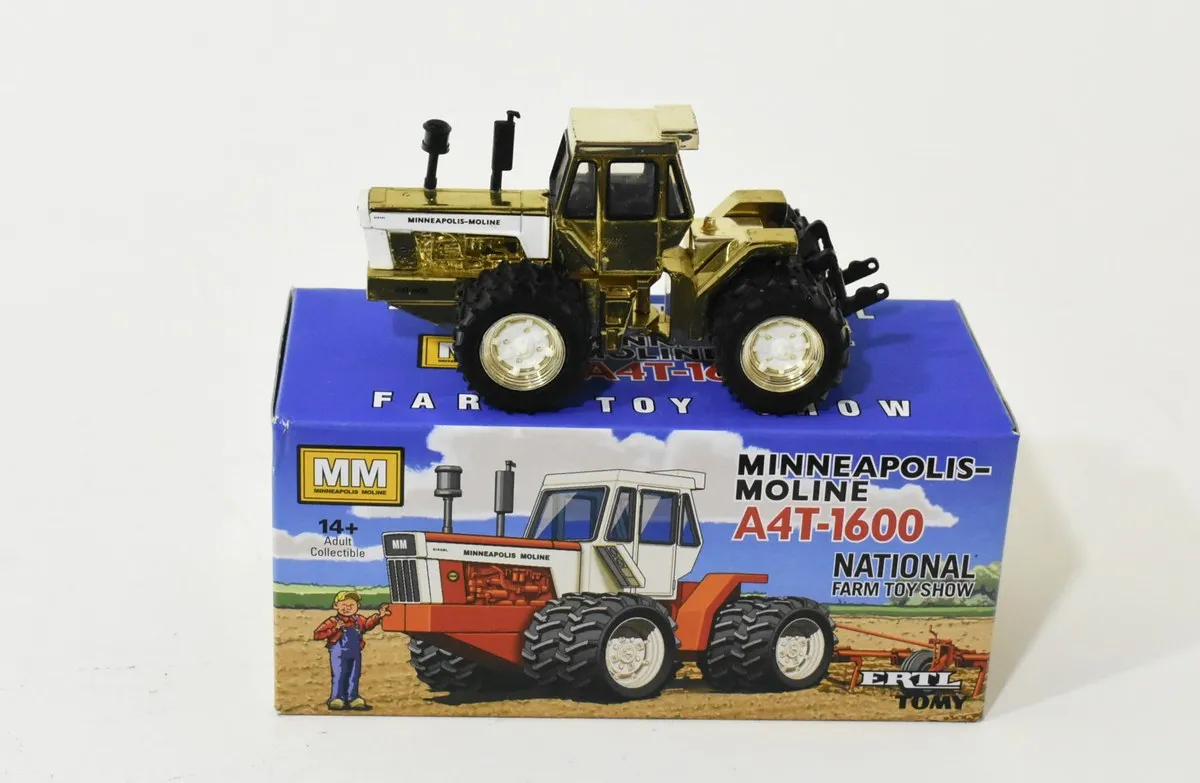 Ertl Minneapolis-Moline A4T-1600 4WD w/Duals Gold 1:64 die-cast replica, 2019 National Farm Toy Show, displayed on its box